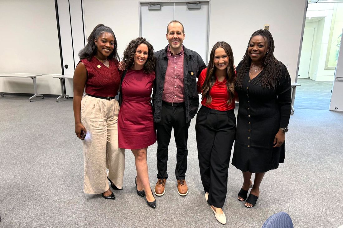 Brittany Davis Morris with fellow marketing professionals after a chapter event