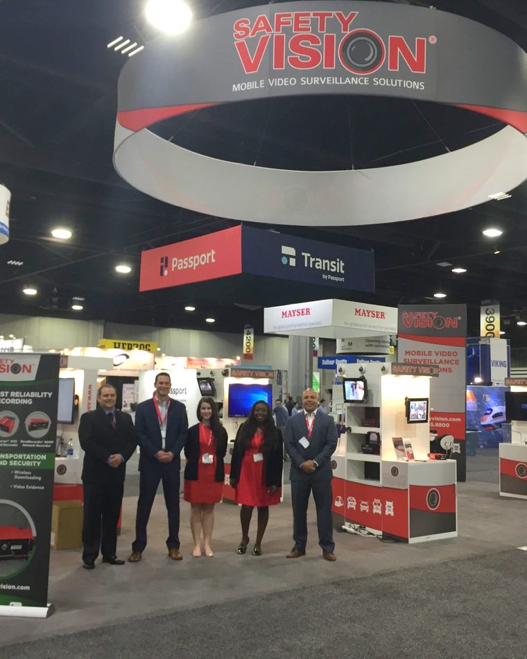 Brittany Davis Morris with the Safety Vision team at the company&rsquo;s tradeshow booth